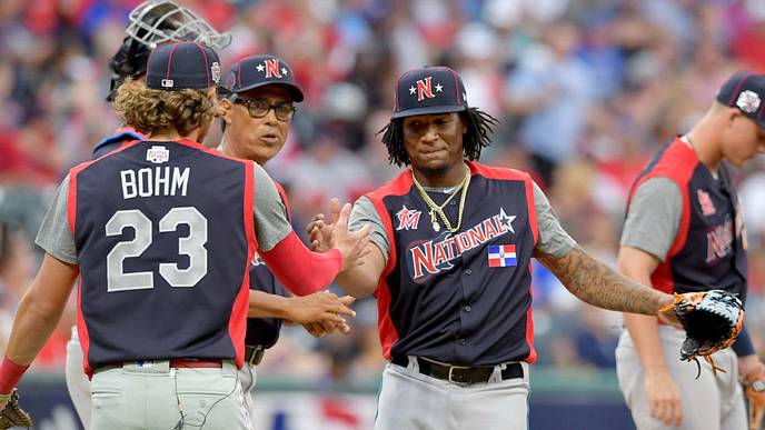 CLEVELAND, OHIO - JULY 07: Alec Bohm #23 celebrates with pitcher Sixto Sanchez #45 as Sanchez leaves the game during the fifth inning against the American League during the All-Stars Futures Game at Progressive Field on July 07, 2019 in Cleveland, Ohio. The American and National League teams tied 2-2. (Photo by Jason Miller/Getty Images) CLEVELAND, OHIO - JULY 07: Alec Bohm #23 celebrates with pitcher Sixto Sanchez #45 as Sanchez leaves the game during the fifth inning against the American League during the All-Stars Futures Game at Progressive Field on July 07, 2019 in Cleveland, Ohio. The American and National League teams tied 2-2. (Photo by Jason Miller/Getty Images)