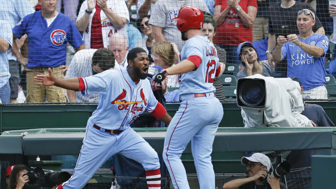 CHICAGO, ILLINOIS - SEPTEMBER 21: Paul DeJong #12 of the St. Louis Cardinals is congratulated by Dexter Fowler #25 following his solo home run during the ninth inning of a game against the Chicago Cubs at Wrigley Field on September 21, 2019 in Chicago, Illinois. (Photo by Nuccio DiNuzzo/Getty Images) CHICAGO, ILLINOIS - SEPTEMBER 21: Paul DeJong #12 of the St. Louis Cardinals is congratulated by Dexter Fowler #25 following his solo home run during the ninth inning of a game against the Chicago Cubs at Wrigley Field on September 21, 2019 in Chicago, Illinois. (Photo by Nuccio DiNuzzo/Getty Images)