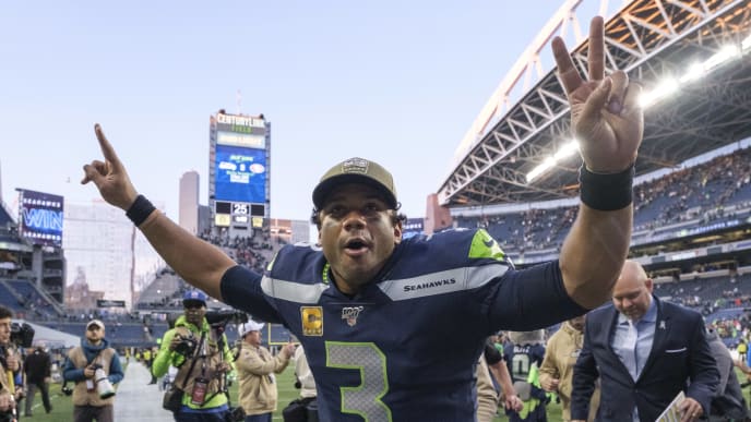 SEATTLE, WA - NOVEMBER 3: Russell Wilson #3 of the Seattle Seahawks celebrates as he leaves the field after a game against the Tampa Bay Buccaneers at CenturyLink Field on November 3, 2019 in Seattle, Washington. The Seahawks won 40-34 in overtime. (Photo by Stephen Brashear/Getty Images) SEATTLE, WA - NOVEMBER 3: Russell Wilson #3 of the Seattle Seahawks celebrates as he leaves the field after a game against the Tampa Bay Buccaneers at CenturyLink Field on November 3, 2019 in Seattle, Washington. The Seahawks won 40-34 in overtime. (Photo by Stephen Brashear/Getty Images)