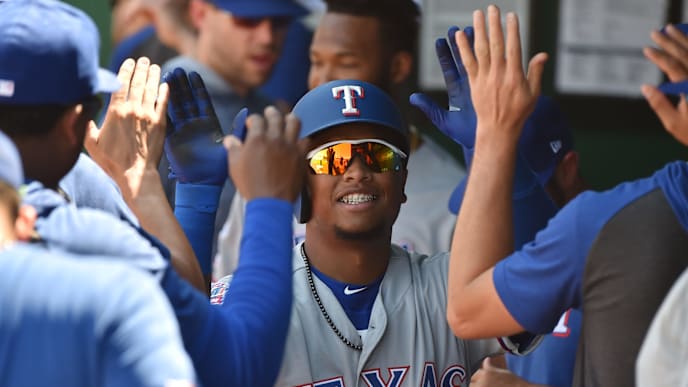 KANSAS CITY, MISSOURI - MAY 16: Willie Calhoun #5 of the Texas Rangers celebrates his home run with teammates in the seventh inning against the Kansas City Royals at Kauffman Stadium on May 16, 2019 in Kansas City, Missouri. (Photo by Ed Zurga/Getty Images) KANSAS CITY, MISSOURI - MAY 16: Willie Calhoun #5 of the Texas Rangers celebrates his home run with teammates in the seventh inning against the Kansas City Royals at Kauffman Stadium on May 16, 2019 in Kansas City, Missouri. (Photo by Ed Zurga/Getty Images)