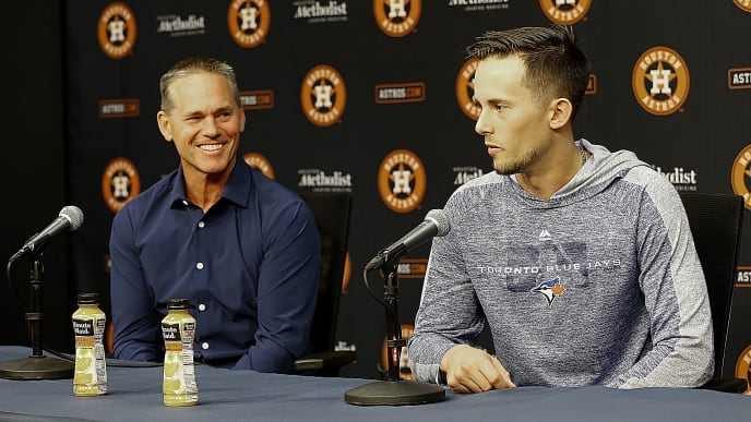 HOUSTON, TEXAS - JUNE 14: Cavan Biggio of the Toronto Blue Jays answers questions from the media as his father Craig Biggio looks on about his emotions are playing in the major leagues and playing this weekend where is hall of famer father Craig Biggio played for so many years at Minute Maid Park on June 14, 2019 in Houston, Texas. (Photo by Bob Levey/Getty Images) HOUSTON, TEXAS - JUNE 14: Cavan Biggio of the Toronto Blue Jays answers questions from the media as his father Craig Biggio looks on about his emotions are playing in the major leagues and playing this weekend where is hall of famer father Craig Biggio played for so many years at Minute Maid Park on June 14, 2019 in Houston, Texas. (Photo by Bob Levey/Getty Images)