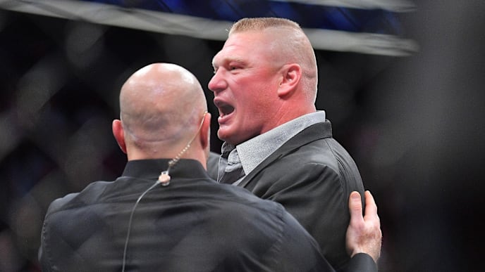 LAS VEGAS, NV - JULY 07: Brock Lesnar (R) challenges Daniel Cormier after Cormier's heavyweight championship fight against Stipe Miocic at T-Mobile Arena on July 7, 2018 in Las Vegas, Nevada. Cormier won by first round knockout. (Photo by Sam Wasson/Getty Images) LAS VEGAS, NV - JULY 07: Brock Lesnar (R) challenges Daniel Cormier after Cormier's heavyweight championship fight against Stipe Miocic at T-Mobile Arena on July 7, 2018 in Las Vegas, Nevada. Cormier won by first round knockout. (Photo by Sam Wasson/Getty Images)