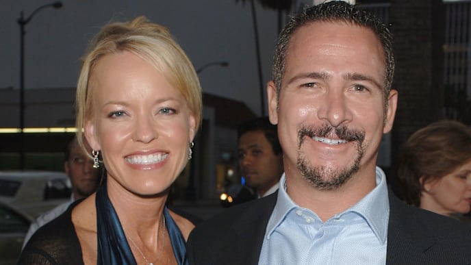 BEVERLY HILLS, CA - SEPTEMBER 26: Sportscaster Jim Rome and his wife Janet attend Universal Pictures' Premiere of "Two For The Money" at the Samuel Goldwyn Theater, Academy of Motion Picture Arts and Sciences on September 26, 2005 in Beverly Hills, California. (Photo by Stephen Shugerman/Getty Images) BEVERLY HILLS, CA - SEPTEMBER 26: Sportscaster Jim Rome and his wife Janet attend Universal Pictures' Premiere of "Two For The Money" at the Samuel Goldwyn Theater, Academy of Motion Picture Arts and Sciences on September 26, 2005 in Beverly Hills, California. (Photo by Stephen Shugerman/Getty Images)