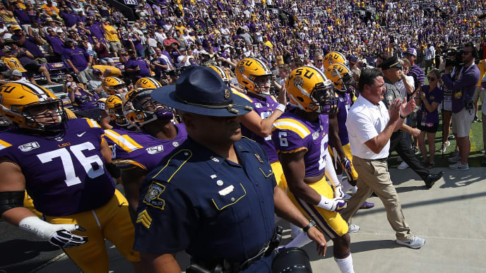 BATON ROUGE, LOUISIANA - OCTOBER 05: Head coach Ed Ogeron of the LSU Tigers leads his team onto the field prior to the game against the Utah State Aggies at Tiger Stadium on October 05, 2019 in Baton Rouge, Louisiana. (Photo by Chris Graythen/Getty Images) BATON ROUGE, LOUISIANA - OCTOBER 05: Head coach Ed Ogeron of the LSU Tigers leads his team onto the field prior to the game against the Utah State Aggies at Tiger Stadium on October 05, 2019 in Baton Rouge, Louisiana. (Photo by Chris Graythen/Getty Images)