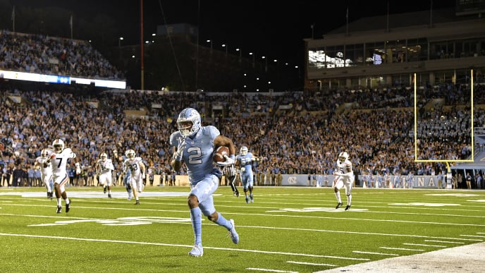 CHAPEL HILL, NORTH CAROLINA - NOVEMBER 02: Dyami Brown #2 of the North Carolina Tar Heels breaks away from the Virginia Cavaliers defense for a touchdown during the second quarter of their game at Kenan Stadium on November 02, 2019 in Chapel Hill, North Carolina. (Photo by Grant Halverson/Getty Images) CHAPEL HILL, NORTH CAROLINA - NOVEMBER 02: Dyami Brown #2 of the North Carolina Tar Heels breaks away from the Virginia Cavaliers defense for a touchdown during the second quarter of their game at Kenan Stadium on November 02, 2019 in Chapel Hill, North Carolina. (Photo by Grant Halverson/Getty Images)