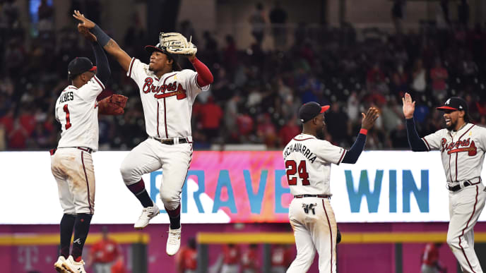 ATLANTA, GEORGIA - SEPTEMBER 07: Ozzie Albies #1 and Ronald Acuna Jr. #13 of the Atlanta Braves high five along with teammates Adeiny Hechavarria #24 and Billy Hamilton #9 after defeating the Washington Nationals at SunTrust Park on September 07, 2019 in Atlanta, Georgia. (Photo by Logan Riely/Getty Images) ATLANTA, GEORGIA - SEPTEMBER 07: Ozzie Albies #1 and Ronald Acuna Jr. #13 of the Atlanta Braves high five along with teammates Adeiny Hechavarria #24 and Billy Hamilton #9 after defeating the Washington Nationals at SunTrust Park on September 07, 2019 in Atlanta, Georgia. (Photo by Logan Riely/Getty Images)