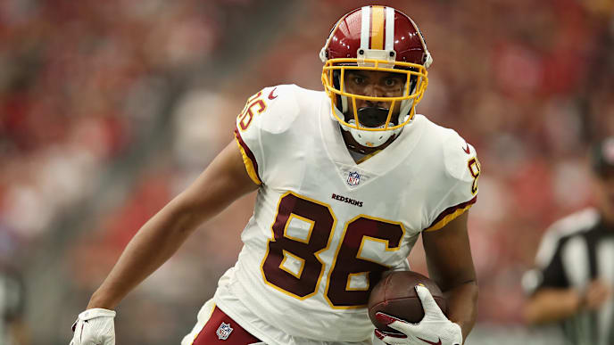 GLENDALE, AZ - SEPTEMBER 09: Tight end Jordan Reed #86 of the Washington Redskins runs with the football after a reception against the Arizona Cardinals during the NFL game at State Farm Stadium on September 9, 2018 in Glendale, Arizona. The Redskins defeated the Cardinals 24-6. (Photo by Christian Petersen/Getty Images) GLENDALE, AZ - SEPTEMBER 09: Tight end Jordan Reed #86 of the Washington Redskins runs with the football after a reception against the Arizona Cardinals during the NFL game at State Farm Stadium on September 9, 2018 in Glendale, Arizona. The Redskins defeated the Cardinals 24-6. (Photo by Christian Petersen/Getty Images)