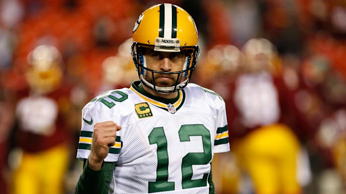 LANDOVER, MD - JANUARY 10: Quarterback Aaron Rodgers #12 of the Green Bay Packers celebrates after the Green Bay Packers defeated the Washington Redskins 35-18 during the NFC Wild Card Playoff game at FedExField on January 10, 2016 in Landover, Maryland. (Photo by Rob Carr/Getty Images) LANDOVER, MD - JANUARY 10: Quarterback Aaron Rodgers #12 of the Green Bay Packers celebrates after the Green Bay Packers defeated the Washington Redskins 35-18 during the NFC Wild Card Playoff game at FedExField on January 10, 2016 in Landover, Maryland. (Photo by Rob Carr/Getty Images)