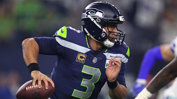 ARLINGTON, TEXAS - JANUARY 05: Russell Wilson #3 of the Seattle Seahawks scrambles in the pocket against the Dallas Cowboys in the first half during the Wild Card Round at AT&T Stadium on January 05, 2019 in Arlington, Texas. (Photo by Tom Pennington/Getty Images) ARLINGTON, TEXAS - JANUARY 05: Russell Wilson #3 of the Seattle Seahawks scrambles in the pocket against the Dallas Cowboys in the first half during the Wild Card Round at AT&T Stadium on January 05, 2019 in Arlington, Texas. (Photo by Tom Pennington/Getty Images)