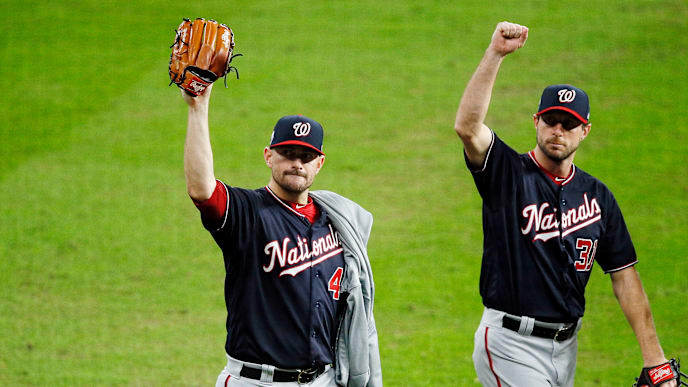 HOUSTON, TEXAS - OCTOBER 29: Daniel Hudson #44 and Max Scherzer #31 of the Washington Nationals celebrate their teams 7-2 win against the Houston Astros in Game Six of the 2019 World Series at Minute Maid Park on October 29, 2019 in Houston, Texas. (Photo by Bob Levey/Getty Images) HOUSTON, TEXAS - OCTOBER 29: Daniel Hudson #44 and Max Scherzer #31 of the Washington Nationals celebrate their teams 7-2 win against the Houston Astros in Game Six of the 2019 World Series at Minute Maid Park on October 29, 2019 in Houston, Texas. (Photo by Bob Levey/Getty Images)