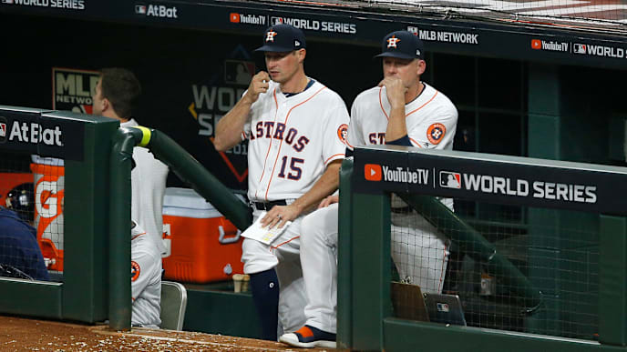 HOUSTON, TEXAS - OCTOBER 29: First base coach Don Kelly #15 and manager AJ Hinch #14 of the Houston Astros look on against the Washington Nationals during the seventh inning in Game Six of the 2019 World Series at Minute Maid Park on October 29, 2019 in Houston, Texas. (Photo by Bob Levey/Getty Images) HOUSTON, TEXAS - OCTOBER 29: First base coach Don Kelly #15 and manager AJ Hinch #14 of the Houston Astros look on against the Washington Nationals during the seventh inning in Game Six of the 2019 World Series at Minute Maid Park on October 29, 2019 in Houston, Texas. (Photo by Bob Levey/Getty Images)