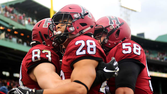 BOSTON, MA - NOVEMBER 17: Jack Cook #83 of the Harvard Crimson reacts after scoring a touchdown during a game against the Yale Bulldogs at Fenway Park on November 17, 2018 in Boston, Massachusetts. (Photo by Adam Glanzman/Getty Images) BOSTON, MA - NOVEMBER 17: Jack Cook #83 of the Harvard Crimson reacts after scoring a touchdown during a game against the Yale Bulldogs at Fenway Park on November 17, 2018 in Boston, Massachusetts. (Photo by Adam Glanzman/Getty Images)