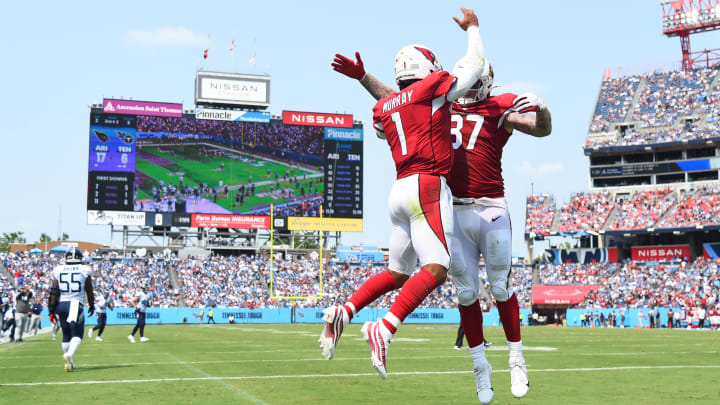 Sep 12, 2021; Nashville, TN; Arizona Cardinals quarterback Kyler Murray (1) celebrates a TD run with Arizona Cardinals tight end Maxx Williams (87) Sep 12, 2021; Nashville, TN; Arizona Cardinals quarterback Kyler Murray (1) celebrates a TD run with Arizona Cardinals tight end Maxx Williams (87)