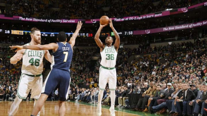 BOSTON, MA - DECEMBER 13: Marcus Smart #36 of the Boston Celtics shoots the ball against the Denver Nuggets on December 13, 2017 at the TD Garden in Boston, Massachusetts. NOTE TO USER: User expressly acknowledges and agrees that, by downloading and or using this photograph, User is consenting to the terms and conditions of the Getty Images License Agreement. Mandatory Copyright Notice: Copyright 2017 NBAE (Photo by Brian Babineau/NBAE via Getty Images)