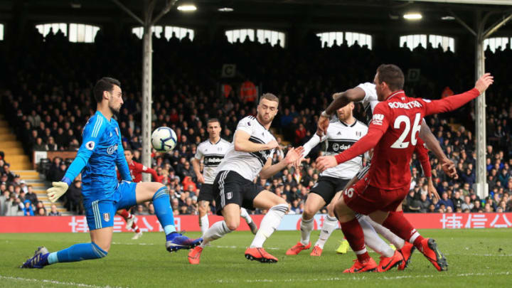 LONDON, ENGLAND - MARCH 17: Sergio Rico of Fulham makes a sav from Andy Robertson of Liverpool during the Premier League match between Fulham FC and Liverpool FC at Craven Cottage on March 17, 2019 in London, United Kingdom. (Photo by Marc Atkins/Getty Images)