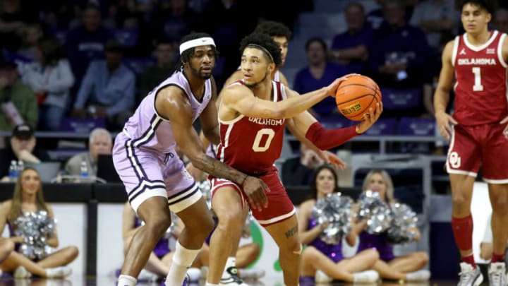 Mar 5, 2022; Manhattan, Kansas, USA; Oklahoma Sooners guard Jordan Goldwire (0) is guarded by Kansas State Wildcats guard Selton Miguel (3) during the first half at Bramlage Coliseum. Mandatory Credit: Scott Sewell-USA TODAY Sports