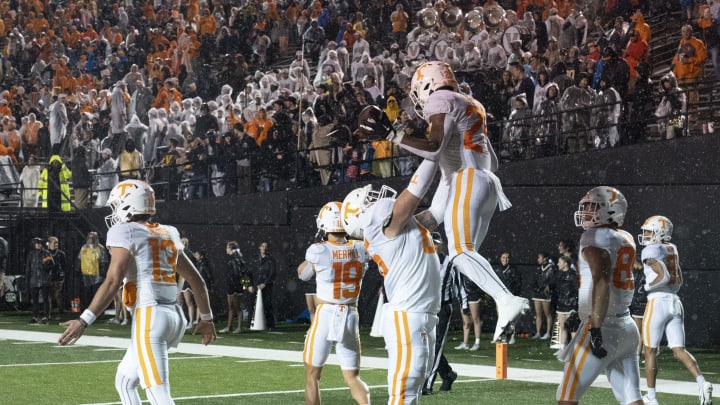 Nov 26, 2022; Nashville, Tennessee, USA; Tennessee Volunteers running back Dylan Sampson (24) celebrates with offensive lineman Parker Ball (65) after scoring a touchdown against the Vanderbilt Commodores during the fourth quarter at FirstBank Stadium. Mandatory Credit: George Walker IV – USA TODAY Sports