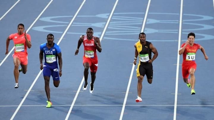Aug 14, 2016; Rio de Janeiro, Brazil; Justin Gatlin (USA) defeats Yohan Blake (JAM) and Bingtian Su (CHN) during the men