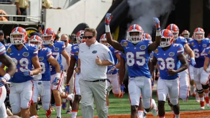 Jan 1, 2016; Orlando, FL, USA; The Florida Gators take the field during the the 2016 Citrus Bowl against the Michigan Wolverines at Orlando Citrus Bowl Stadium. Mandatory Credit: Reinhold Matay-USA TODAY Sports