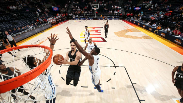 SALT LAKE CITY, UT – JULY 5: Derrick White #4 of the San Antonio Spurs goes to the basket against the Memphis Grizzlies on July 5, 2018 at Vivint Smart Home Arena in Salt Lake City, Utah.