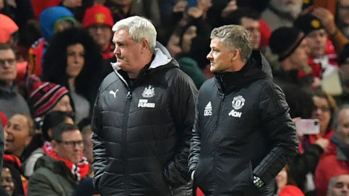 Manchester United's Norwegian manager Ole Gunnar Solskjaer (R) and Newcastle United's English head coach Steve Bruce (L) arrive for the English Premier League football match between Manchester United and Newcastle United at Old Trafford in Manchester, north west England, on December 26, 2019. (Photo by Paul ELLIS / AFP) / RESTRICTED TO EDITORIAL USE. No use with unauthorized audio, video, data, fixture lists, club/league logos or 'live' services. Online in-match use limited to 120 images. An additional 40 images may be used in extra time. No video emulation. Social media in-match use limited to 120 images. An additional 40 images may be used in extra time. No use in betting publications, games or single club/league/player publications. / (Photo by PAUL ELLIS/AFP via Getty Images)