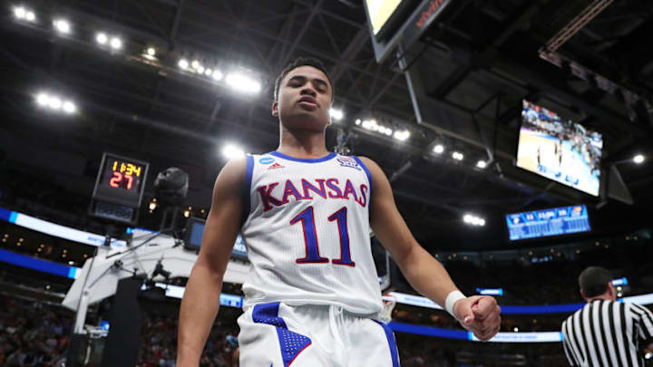 SALT LAKE CITY, UTAH - MARCH 21: Devon Dotson #11 of the Kansas Jayhawks reacts during the first half against the Northeastern Huskies in the first round of the 2019 NCAA Men's Basketball Tournament at Vivint Smart Home Arena on March 21, 2019 in Salt Lake City, Utah. (Photo by Tom Pennington/Getty Images)