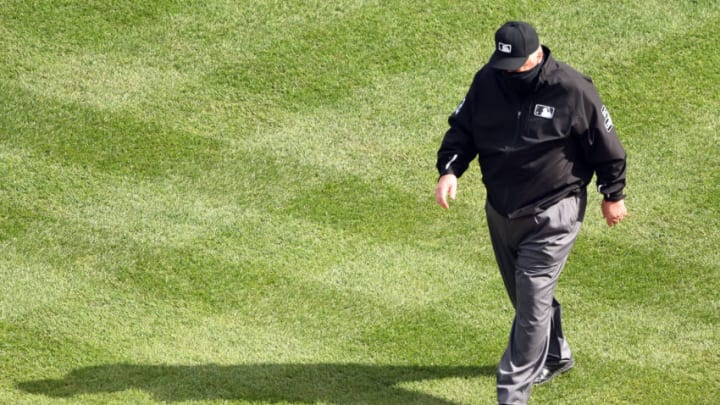 WASHINGTON, DC - SEPTEMBER 27: Umpire Joe West walks to third base before a baseball game between the Washington Nationals and the New York Mets at Nationals Park on September 27, 2020 in Washington, DC. (Photo by Mitchell Layton/Getty Images)