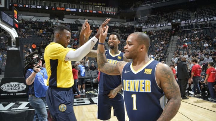 SAN ANTONIO, TX - OCTOBER 8: Paul Millsap #4, Wilson Chandler #21 and Jameer Nelson #1 of the Denver Nuggets shake hands before the preseason game against the San Antonio Spurs on October 8, 2017 at the AT&T Center in San Antonio, Texas. NOTE TO USER: User expressly acknowledges and agrees that, by downloading and or using this photograph, user is consenting to the terms and conditions of the Getty Images License Agreement. Mandatory Copyright Notice: Copyright 2017 NBAE (Photos by Mark Sobhani/NBAE via Getty Images)