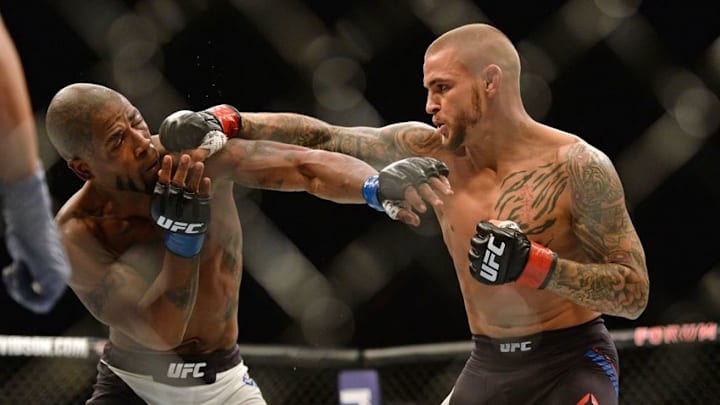 Jun 4, 2016; Los Angeles, CA, USA; Bobby Green (blue) fights Dustin Poirier (red) during UFC 199 at The Forum. Mandatory Credit: Jake Roth-USA TODAY Sports
