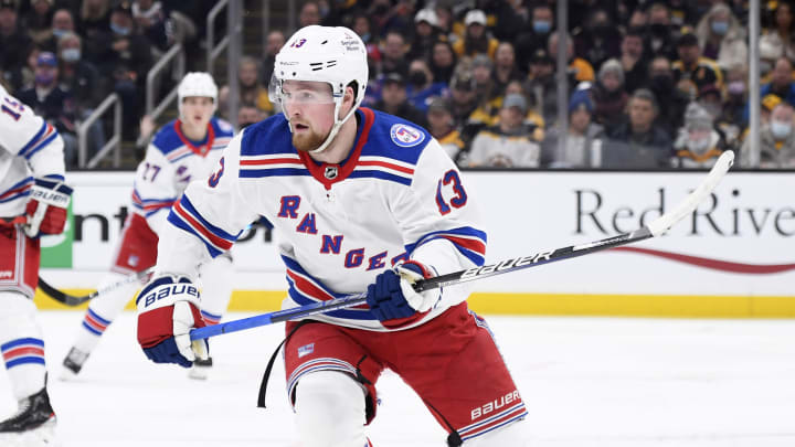 Nov 26, 2021; Boston, Massachusetts, USA; New York Rangers left wing Alexis Lafreniere (13) follows the play during the third period against the Boston Bruins at TD Garden. Mandatory Credit: Bob DeChiara-USA TODAY Sports