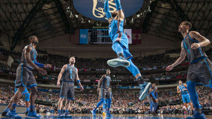 DALLAS, TX - NOVEMBER 10: Steven Adams #12 of the Oklahoma City Thunder dunks the ball during the game against the Dallas Mavericks on November 10, 2018 at the American Airlines Center in Dallas, Texas. NOTE TO USER: User expressly acknowledges and agrees that, by downloading and or using this photograph, User is consenting to the terms and conditions of the Getty Images License Agreement. Mandatory Copyright Notice: Copyright 2018 NBAE (Photo by Glenn James/NBAE via Getty Images)