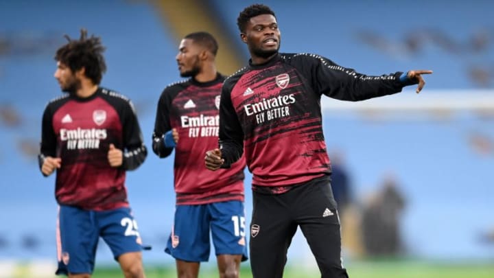 Arsenal's Thomas Partey (R) (Photo by MICHAEL REGAN/POOL/AFP via Getty Images)