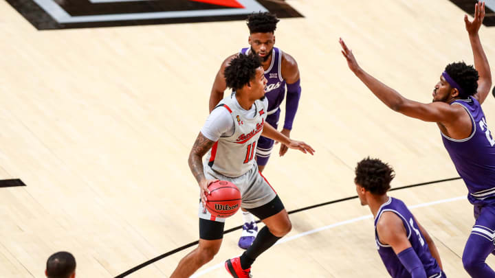 LUBBOCK, TEXAS – MARCH 02: Guard Kyler Edwards #11 of the Texas Tech Red Raiders handles the ball during the first half of the college basketball game against the TCU Horned Frogs at United Supermarkets Arena on March 02, 2021 in Lubbock, Texas. (Photo by John E. Moore III/Getty Images)