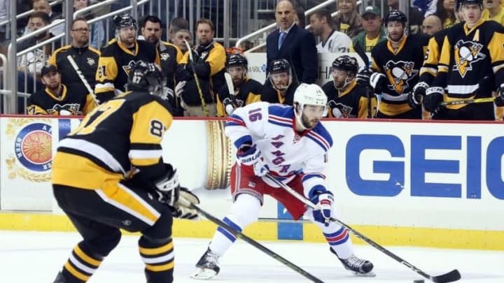Apr 23, 2016; Pittsburgh, PA, USA; New York Rangers center Derick Brassard (16) skates with the puck as Pittsburgh Penguins center Sidney Crosby (87 )defends during the second period in game five of the first round of the 2016 Stanley Cup Playoffs at the CONSOL Energy Center. Mandatory Credit: Charles LeClaire-USA TODAY Sports