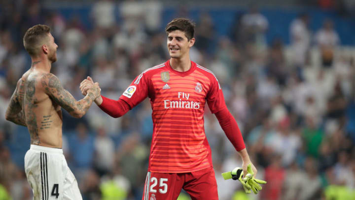 MADRID, SPAIN - SEPTEMBER 1: (L-R) Sergio Ramos of Real Madrid, Thibaut Courtois of Real Madrid celebrates the victory during the La Liga Santander match between Real Madrid v Leganes at the Santiago Bernabeu on September 1, 2018 in Madrid Spain (Photo by David S. Bustamante/Soccrates/Getty Images)