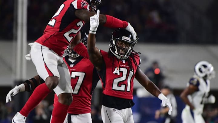 LOS ANGELES, CA - JANUARY 06: Cornerback Desmond Trufant #21 of the Atlanta Falcons celebrates his defensive play with teammates during the first quarter of the NFC Wild Card Playoff game against the Los Angeles Rams at Los Angeles Coliseum on January 6, 2018 in Los Angeles, California. (Photo by Harry How/Getty Images)