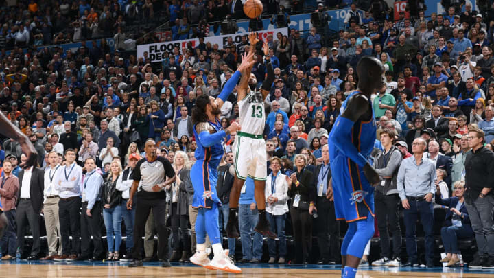 Marcus Morris #13 of the Boston Celtics makes a three point basket to take the lead late in the 4th quarter against the Oklahoma City Thunder on October 25, 2018 at Chesapeake Energy Arena in Oklahoma City, Oklahoma. Photo by Garrett Ellwood/NBAE via Getty Images)