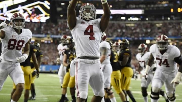 Dec 6, 2014; Atlanta, GA, USA; Alabama Crimson Tide running back T.J. Yeldon (4) celebrates his touchdown during the first quarter during the 2014 SEC Championship Game against the Missouri Tigers at the Georgia Dome. Mandatory Credit: Dale Zanine-USA TODAY Sports Dec 6, 2014; Atlanta, GA, USA; Alabama Crimson Tide running back T.J. Yeldon (4) celebrates his touchdown during the first quarter during the 2014 SEC Championship Game against the Missouri Tigers at the Georgia Dome. Mandatory Credit: Dale Zanine-USA TODAY Sports