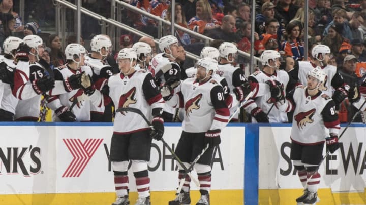 EDMONTON, AB - JANUARY 18: Christian Dvorak #18, Phil Kessel #81 and Conor Garland #83 of the Arizona Coyotes celebrate a goal against the Edmonton Oilers on January 18, 2020, at Rogers Place in Edmonton, Alberta, Canada. (Photo by Andy Devlin/NHLI via Getty Images)