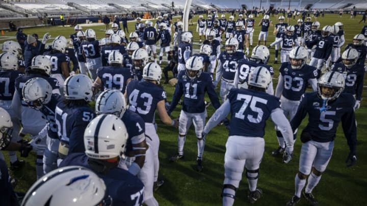 STATE COLLEGE, PA - DECEMBER 19: Penn State Nittany Lions players take the field before the game against the Illinois Fighting Illini at Beaver Stadium on December 19, 2020 in State College, Pennsylvania. (Photo by Scott Taetsch/Getty Images)