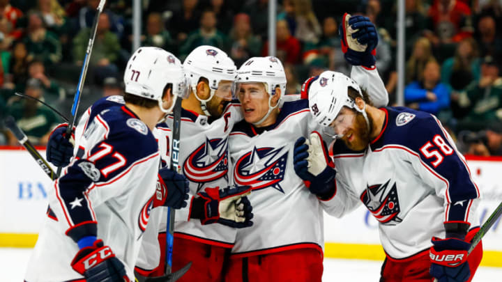 ST. PAUL, MN - OCTOBER 14: The Columbus Blue Jackets celebrate after right wing Josh Anderson (77) (L) scored in the 3rd period to tie the game at 4-4 during the regular season game between the Columbus Blue Jackets and the Minnesota Wild on October 14, 2017 at Xcel Energy Center in St. Paul, Minnesota. The Blue Jackets defeated the Wild 5-4 in overtime. (Photo by David Berding/Icon Sportswire via Getty Images)