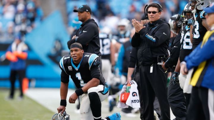 Dec 24, 2016; Charlotte, NC, USA; Carolina Panthers quarterback Cam Newton (1) kneels on the sidelines during the fourth quarter against the Atlanta Falcons at Bank of America Stadium. The Falcons defeated the Panthers 33-16. Mandatory Credit: Jeremy Brevard-USA TODAY Sports