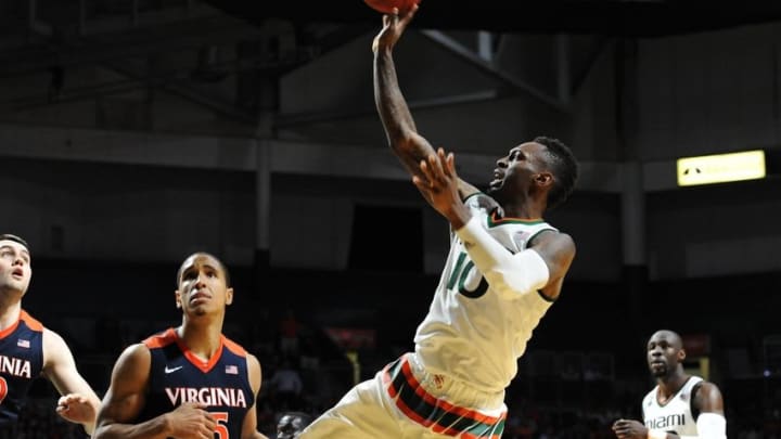 Feb 22, 2016; Coral Gables, FL, USA; University of Miami Hurricanes guard Sheldon McClellan (10) shoots over Virginia Cavalier