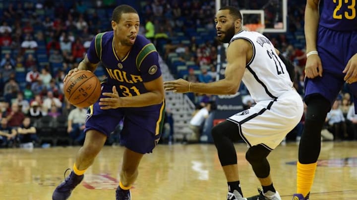 Jan 30, 2016; New Orleans, LA, USA; New Orleans Pelicans guard Bryce Dejean-Jones (31) attempts to get past Brooklyn Nets guard Wayne Ellington (21) during the first quarter of the game at the Smoothie King Center. The Pelicans won 105-103. Mandatory Credit: Matt Bush-USA TODAY Sports