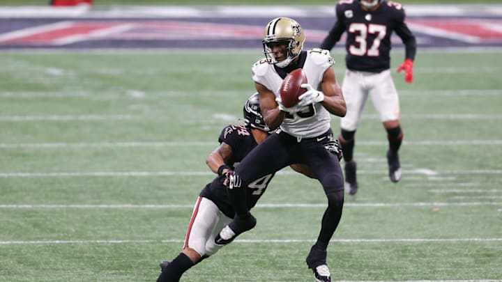 ATLANTA, GEORGIA – DECEMBER 06: Michael Thomas #13 of the New Orleans Saints makes the third quarter reception against A.J. Terrell #24 of the Atlanta Falcons at Mercedes-Benz Stadium on December 06, 2020 in Atlanta, Georgia. (Photo by Kevin C. Cox/Getty Images)