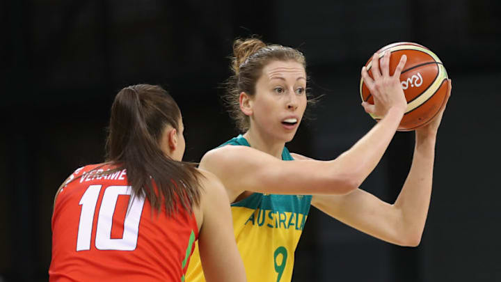 RIO DE JANEIRO, BRAZIL - AUGUST 13: Natalie Burton of Australia passes during the Women's round Group A basketball match between Australia and Belarus on Day 7 of the Rio 2016 Olympic Games at the Youth Arena in Rio de Janeiro on August 13, 2016 in Rio de Janeiro, Brazil. (Photo by Mark Kolbe/Getty Images)