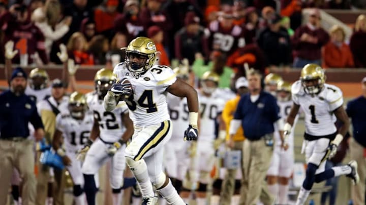 Nov 12, 2016; Blacksburg, VA, USA; Georgia Tech Yellow Jackets running back Marcus Marshall (34) runs for a touchdown during the third quarter against the Virginia Tech Hokies at Lane Stadium. Mandatory Credit: Peter Casey-USA TODAY Sports