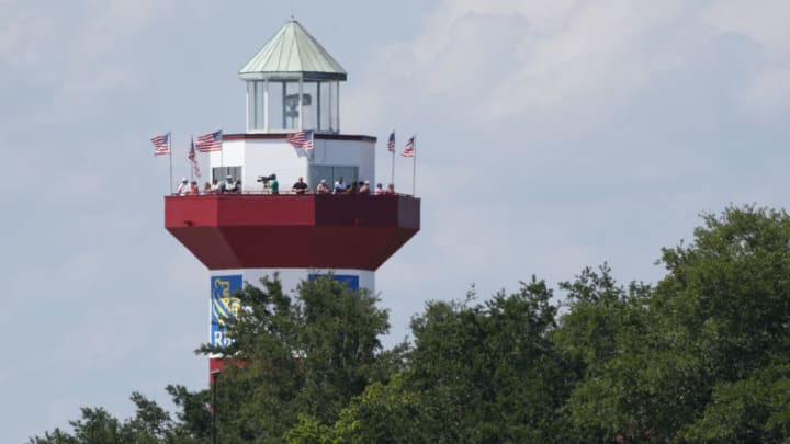 Jun 20, 2020; Hilton Head, South Carolina, USA; Spectators watch action on the 18th green from the light tower during the third round of the RBC Heritage golf tournament at Harbour Town Golf Links. Mandatory Credit: Brian Spurlock-USA TODAY Sports