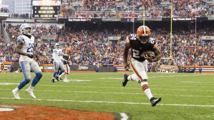 Nov 21, 2021; Cleveland, Ohio, USA; Cleveland Browns running back Nick Chubb (24) runs the ball into the end zone for a touchdown against the Detroit Lions during the second quarter at FirstEnergy Stadium. Mandatory Credit: Scott Galvin-USA TODAY Sports