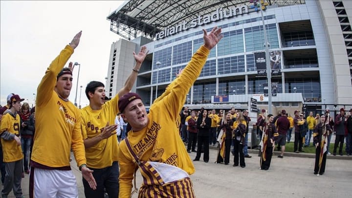 Dec 27, 2013; Houston, TX, USA; Minnesota Golden Gophers fans cheer as the team arrives before the Texas Bowl against the Syracuse Orange at Reliant Stadium . Mandatory Credit: Troy Taormina-USA TODAY Sports